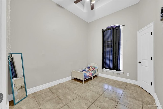 interior space with ceiling fan and light tile patterned floors