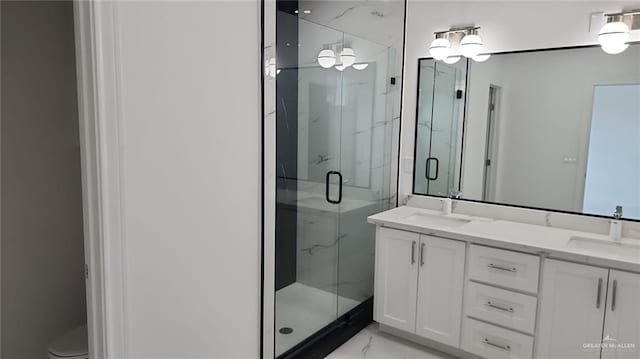 bathroom with vanity and an enclosed shower