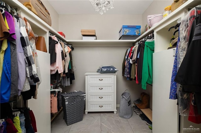 10312 N 31st St, Mcallen, TX 78504 - walk in closet with a chandelier and light marble finish flooring