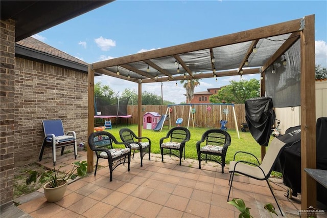 10312 N 31st St, Mcallen, TX 78504 - view of patio / terrace featuring a trampoline and a playground