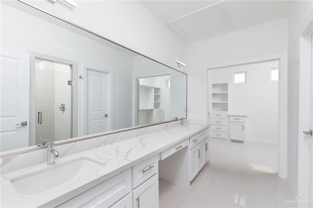 701 Helen St, Mission, TX 78574 - full bathroom with a shower stall, double vanity, and tile patterned floors