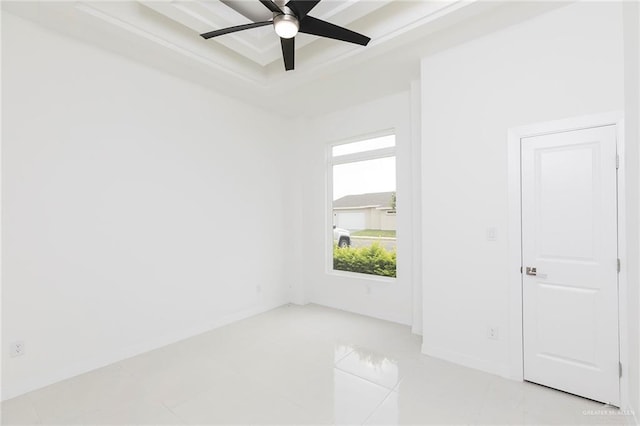 701 Helen St, Mission, TX 78574 - unfurnished room featuring ceiling fan, baseboards, and a raised ceiling