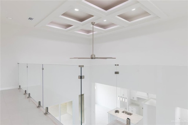 701 Helen St, Mission, TX 78574 - detailed view of coffered ceiling, beamed ceiling, recessed lighting, ceiling fan, and baseboards