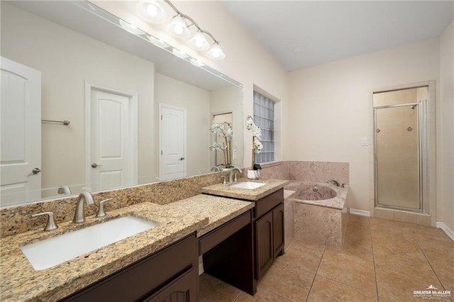 bathroom featuring vanity, independent shower and bath, and tile patterned flooring