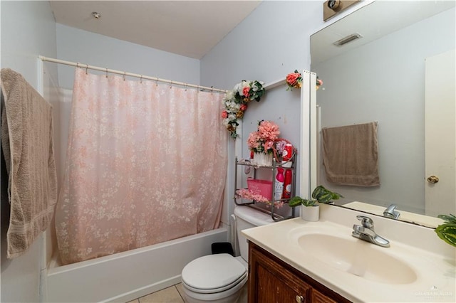 6402 S Mars Ln, Pharr, TX 78577 - full bath featuring vanity, toilet, tile patterned floors, and shower / bath combo