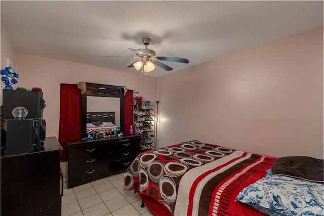 6402 S Mars Ln, Pharr, TX 78577 - bedroom featuring light tile patterned floors and a ceiling fan