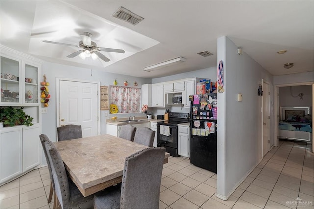 6402 S Mars Ln, Pharr, TX 78577 - dining area featuring light tile patterned floors, visible vents, and ceiling fan