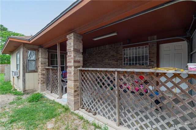 6402 S Mars Ln, Pharr, TX 78577 - view of property exterior featuring brick siding and covered porch