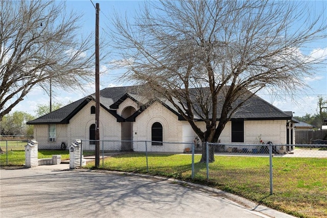 french provincial home with a front yard