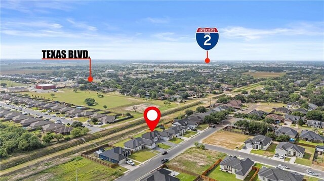 3108 Travis St, Weslaco, TX 78599 - aerial view of property's location with nearby suburban area