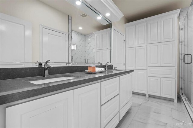 3108 Travis St, Weslaco, TX 78599 - bathroom featuring marble finish flooring, a marble finish shower, double vanity, and recessed lighting