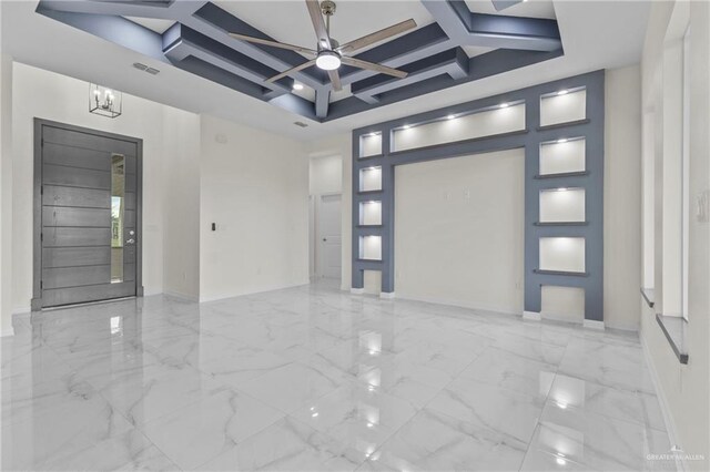 3108 Travis St, Weslaco, TX 78599 - foyer with coffered ceiling, a ceiling fan, marble finish floors, a chandelier, and beam ceiling