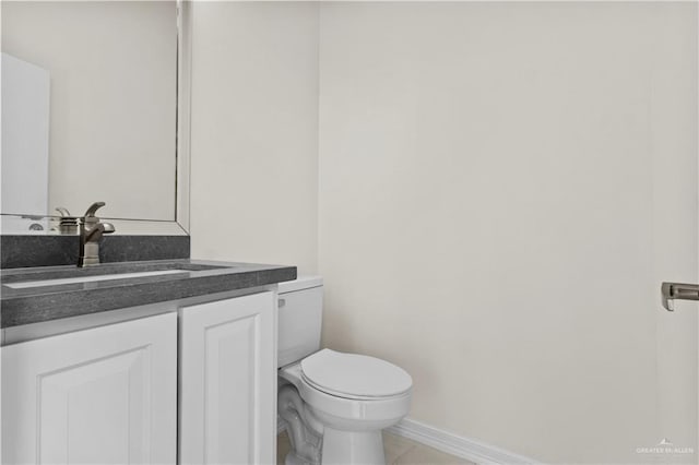 3108 Travis St, Weslaco, TX 78599 - half bath featuring vanity and toilet