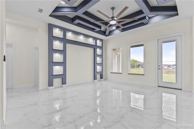 3108 Travis St, Weslaco, TX 78599 - unfurnished room featuring a ceiling fan, coffered ceiling, marble finish floors, and beam ceiling
