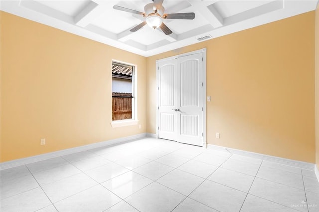 3210 Salvador Ave, Edinburg, TX 78539 - unfurnished room with coffered ceiling, light tile patterned floors, ceiling fan, visible vents, and beam ceiling