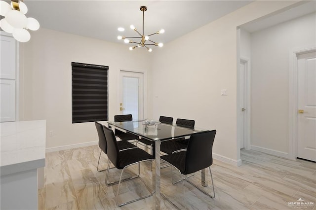 1923 Lime St, San Juan, TX 78589 - dining area with a chandelier and baseboards