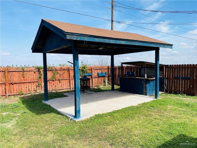 view of patio / terrace featuring an outdoor bar and a gazebo