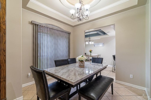 3831 Spicewood Dr, Edinburg, TX 78542 - dining area with a chandelier, a raised ceiling, light tile patterned floors, crown molding, and baseboards