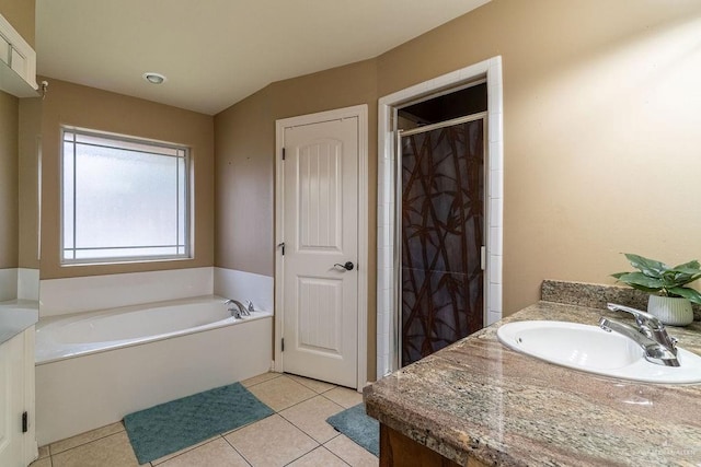 3831 Spicewood Dr, Edinburg, TX 78542 - full bath with a garden tub, tile patterned floors, vanity, and a stall shower