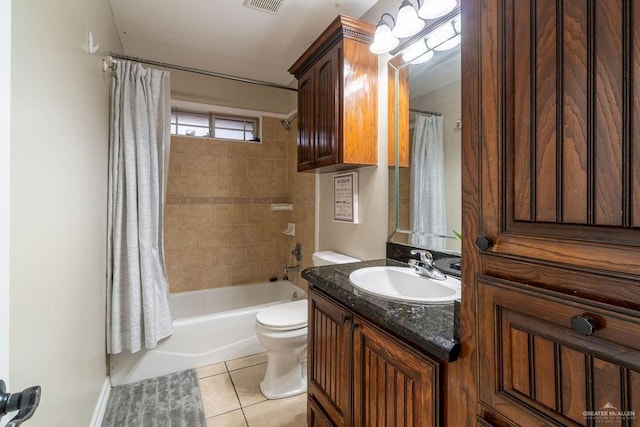 3831 Spicewood Dr, Edinburg, TX 78542 - full bath featuring tile patterned floors, toilet, vanity, and shower / tub combo with curtain