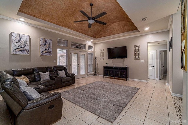3831 Spicewood Dr, Edinburg, TX 78542 - living area featuring a tray ceiling, ceiling fan, light tile patterned flooring, ornamental molding, and vaulted ceiling