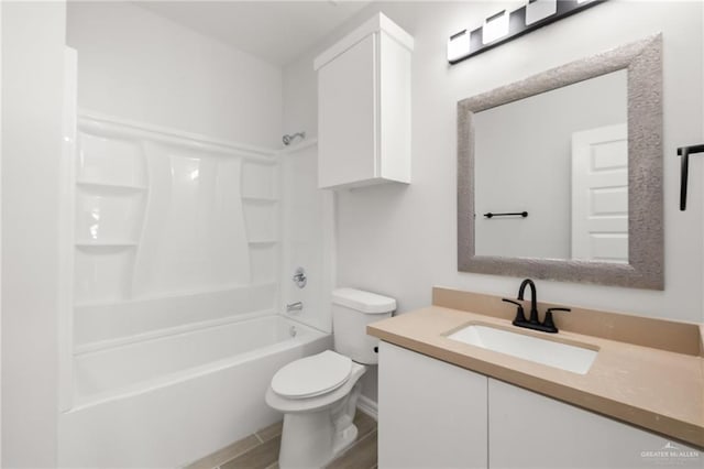 full bathroom featuring vanity,  shower combination, toilet, and wood-type flooring