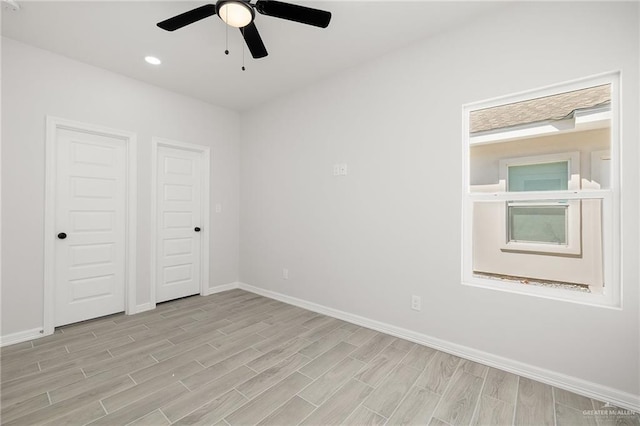 spare room featuring ceiling fan