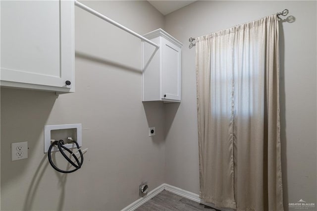 laundry room with washer hookup, wood finished floors, electric dryer hookup, and baseboards