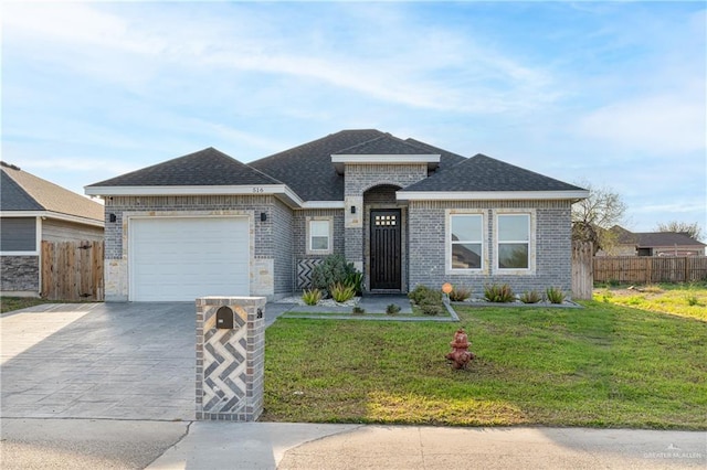 single story home with concrete driveway, a front lawn, an attached garage, and fence