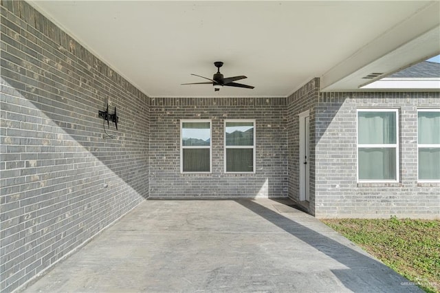 view of patio / terrace featuring a ceiling fan