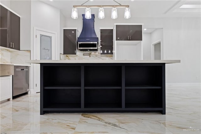 kitchen with wall oven, pendant lighting, and stainless steel dishwasher