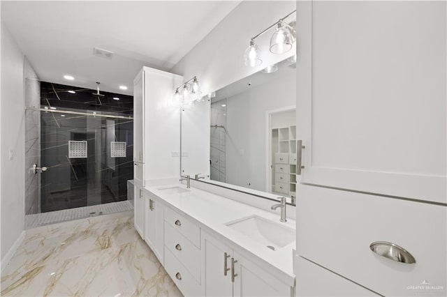 bathroom with vanity and an enclosed shower