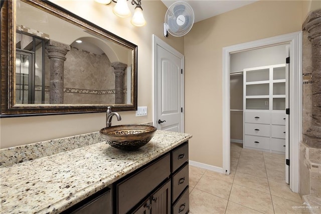 bathroom with vanity and tile patterned floors