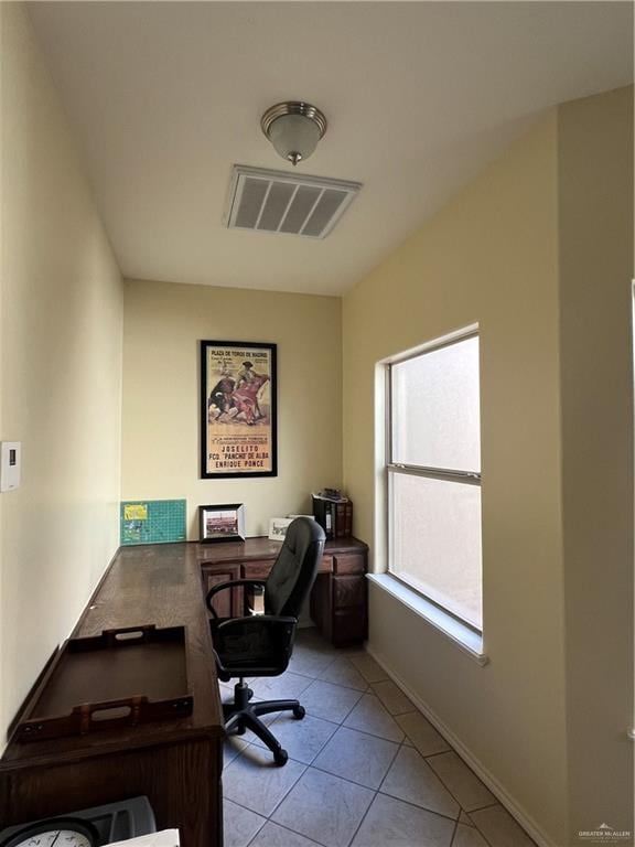 office space featuring light tile patterned floors