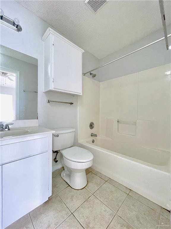 full bathroom featuring visible vents, a textured ceiling, and tile patterned floors