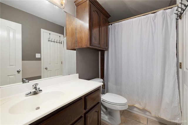 3608 Kingsborough Ave, Mcallen, TX 78504 - bathroom featuring vanity, tile patterned floors, and toilet