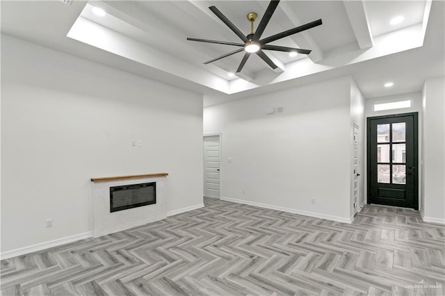 unfurnished living room with light parquet floors and ceiling fan