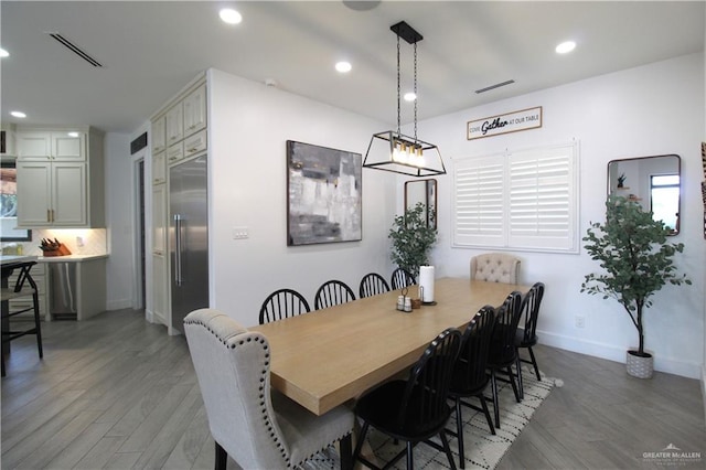 dining room featuring dark wood-type flooring