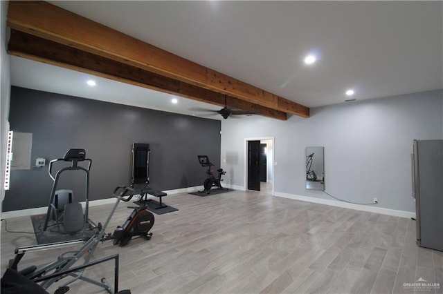 workout room featuring ceiling fan and light wood-type flooring