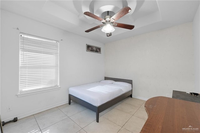 bedroom featuring light tile patterned floors and ceiling fan