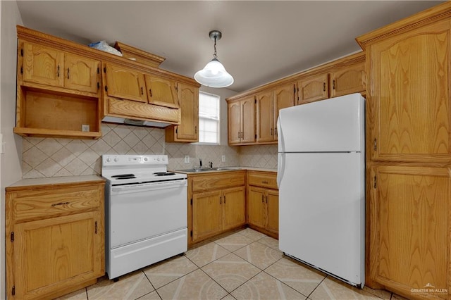 kitchen with backsplash, white appliances, sink, pendant lighting, and light tile patterned floors