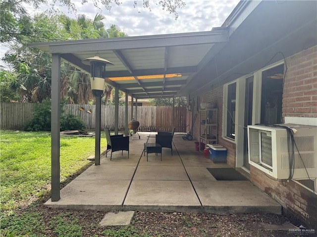 907 W 7th St, Weslaco, TX 78596 - fenced backyard featuring a patio