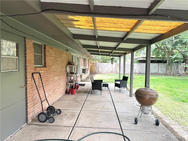 907 W 7th St, Weslaco, TX 78596 - fenced backyard with a patio