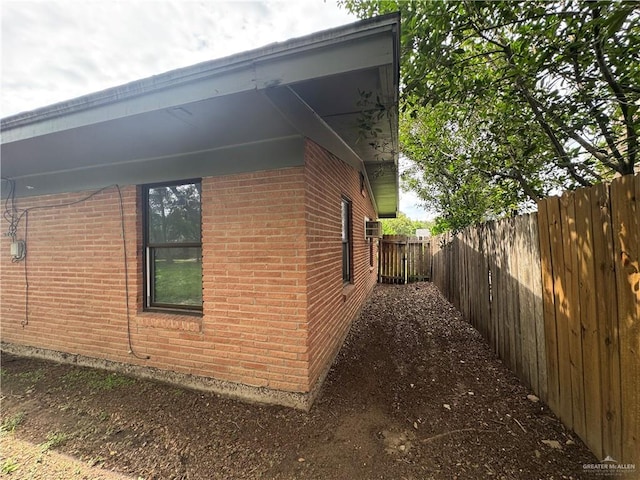 907 W 7th St, Weslaco, TX 78596 - view of property exterior with brick siding