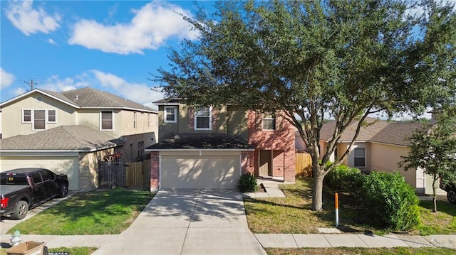 front facade featuring a front yard and a garage