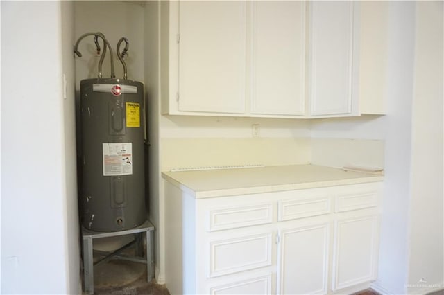 utility room featuring electric water heater