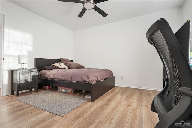 bedroom featuring ceiling fan and light wood-style floors