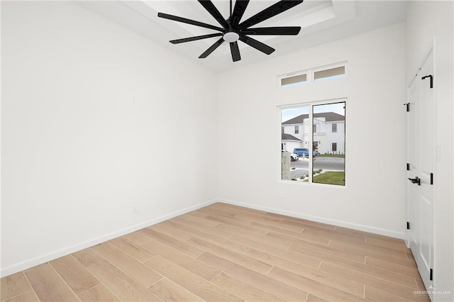 1003 Bette St, Pharr, TX 78577 - unfurnished room with ceiling fan, baseboards, and light wood-style flooring