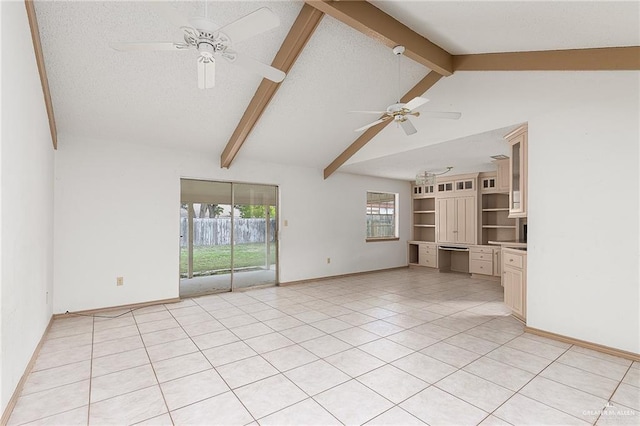 unfurnished living room with a textured ceiling, lofted ceiling with beams, ceiling fan, and light tile patterned flooring