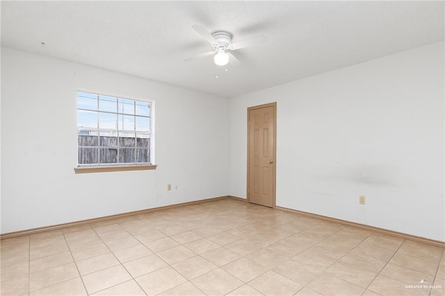 spare room featuring ceiling fan